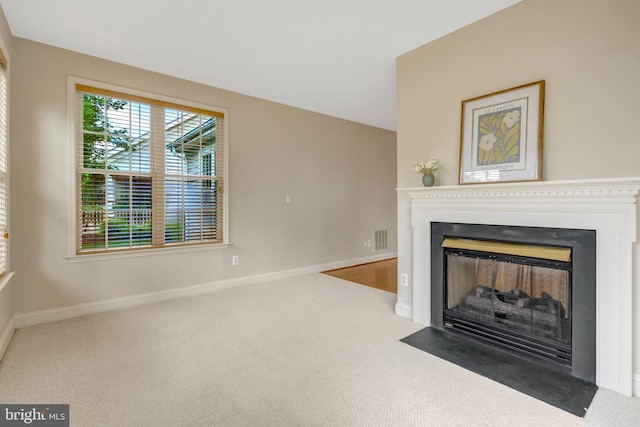 13854 Cinch Ln, Gainesville, VA 20155 - unfurnished living room featuring carpet and a fireplace with flush hearth