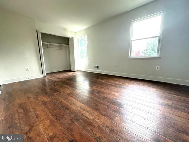 7851 W Point Ct, Manassas, VA 20109 - unfurnished bedroom featuring wood-type flooring and a closet