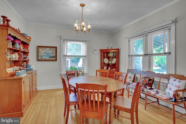 23 Trebor Pl, Reading, PA 19610 - dining area with light wood finished floors, a chandelier, and ornamental molding