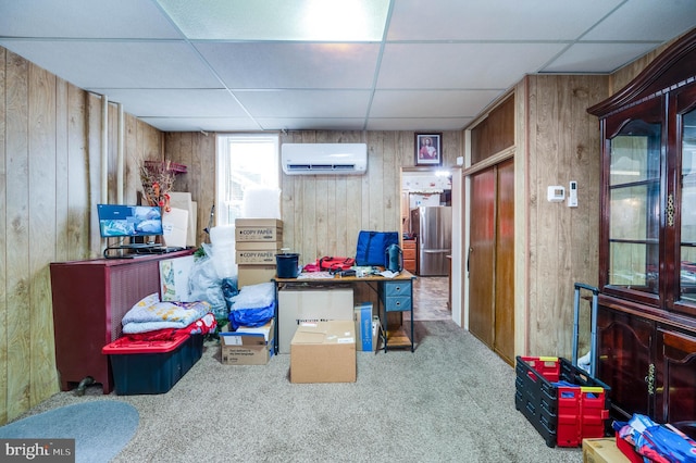 930 Elm St, Reading, PA 19601 - home office with a wall mounted air conditioner, a drop ceiling, carpet, and wood walls