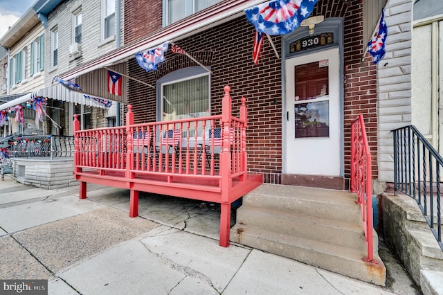 930 Elm St, Reading, PA 19601 - doorway to property featuring brick siding and cooling unit