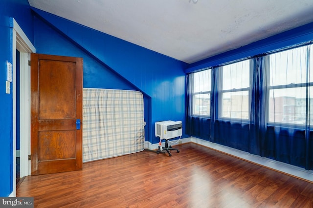 930 Elm St, Reading, PA 19601 - spare room with wood finished floors and vaulted ceiling