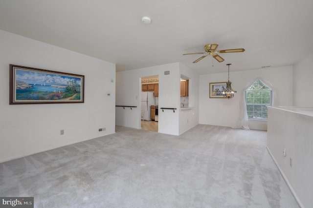 3808 Adelaide Dr, Mount Laurel, NJ 08054 - unfurnished living room with a ceiling fan, light colored carpet, and a chandelier