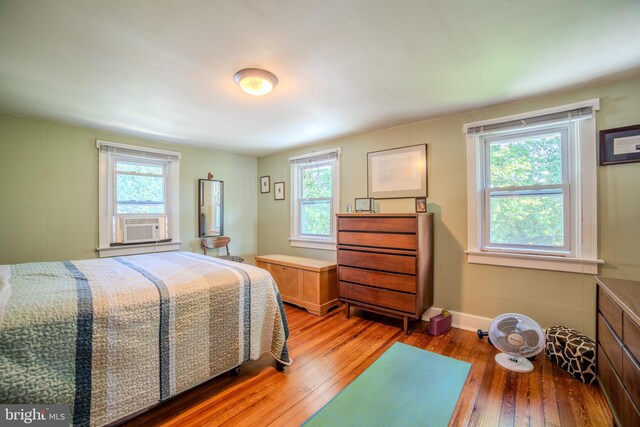 38 E Old Baltimore Pike, Media, PA 19063 - bedroom featuring multiple windows, hardwood / wood-style flooring, and cooling unit