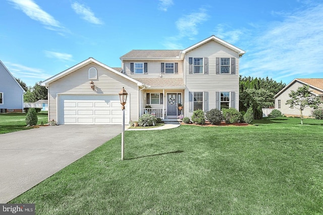 13 Fieldcrest Dr, Littlestown, PA 17340 - traditional-style house featuring concrete driveway, a front yard, an attached garage, and a porch