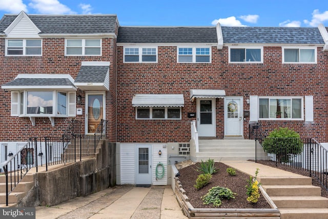 3647 Friar Rd, Philadelphia, PA 19154 - view of property featuring brick siding and roof with shingles
