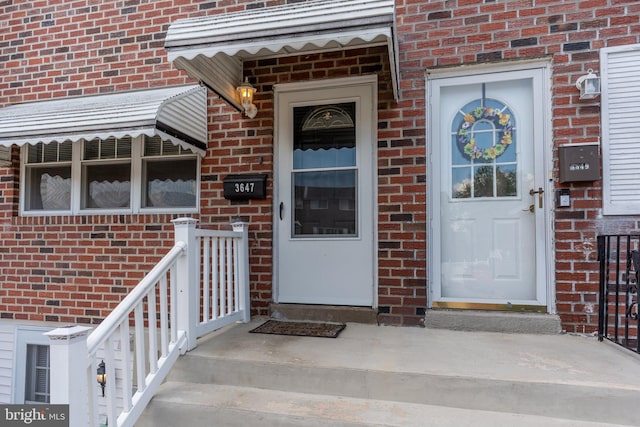 3647 Friar Rd, Philadelphia, PA 19154 - doorway to property featuring brick siding