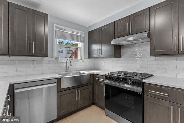 3647 Friar Rd, Philadelphia, PA 19154 - kitchen featuring stainless steel appliances, under cabinet range hood, decorative backsplash, and light tile patterned flooring