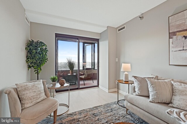 2400 Clarendon Blvd Unit 811, Arlington, VA 22201 - living room featuring wood finished floors and baseboards