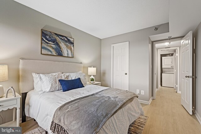2400 Clarendon Blvd Unit 811, Arlington, VA 22201 - bedroom featuring light wood-style flooring and baseboards