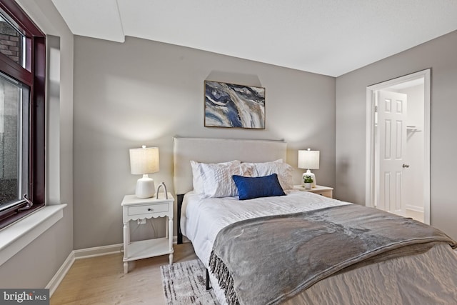 2400 Clarendon Blvd Unit 811, Arlington, VA 22201 - bedroom with wood finished floors and baseboards