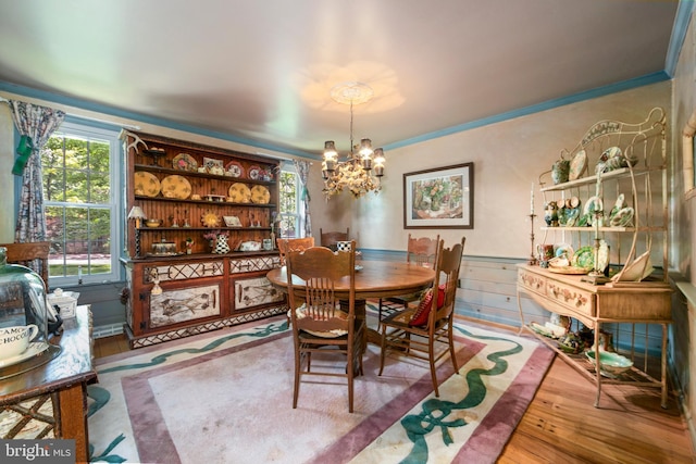 201 Laurence Dr, Moorestown, NJ 08057 - dining room with a chandelier, wood finished floors, wainscoting, and ornamental molding