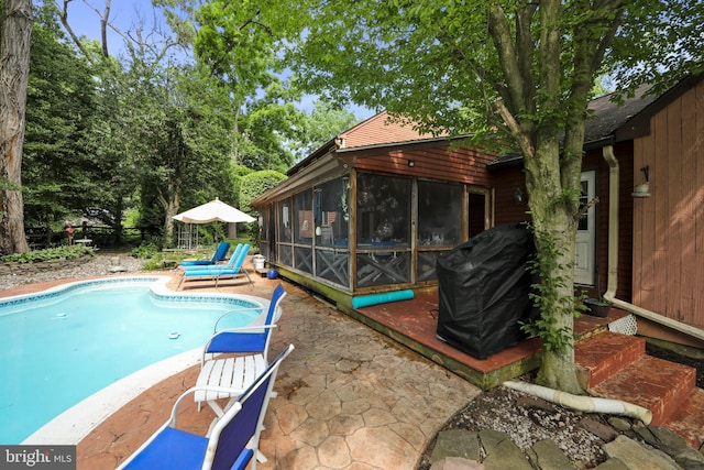201 Laurence Dr, Moorestown, NJ 08057 - swimming pool featuring a sunroom, a patio area, and grilling area