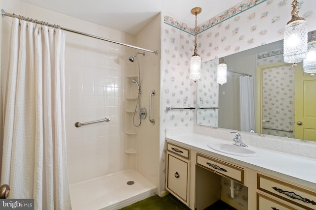 418 1st Ave, Clearfield, PA 16830 - bathroom featuring wallpapered walls, a tile shower, and vanity