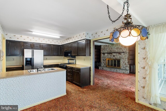 418 1st Ave, Clearfield, PA 16830 - kitchen featuring stainless steel refrigerator with ice dispenser, black microwave, dark colored carpet, and dark brown cabinetry
