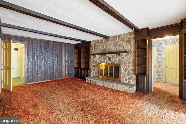 418 1st Ave, Clearfield, PA 16830 - unfurnished living room with carpet, beamed ceiling, and a fireplace