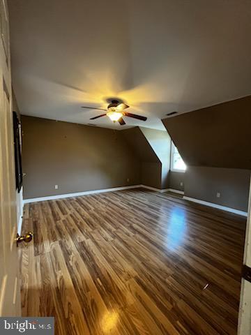 8535 Colony Cir, Easton, MD 21601 - additional living space featuring wood finished floors, a ceiling fan, and vaulted ceiling