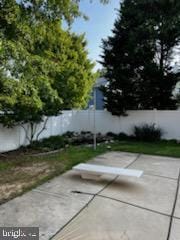 8535 Colony Cir, Easton, MD 21601 - fenced backyard featuring a patio