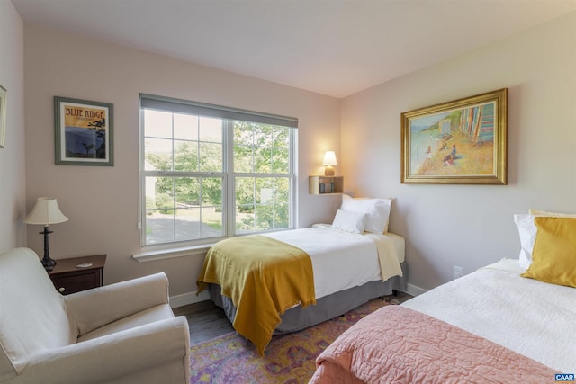 220 Buttercup Ln, Charlottesville, VA 22902 - bedroom with multiple windows and wood finished floors