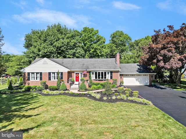 1512 Marsh Rd, Wilmington, DE 19803 - single story home with brick siding, driveway, a garage, and a front lawn