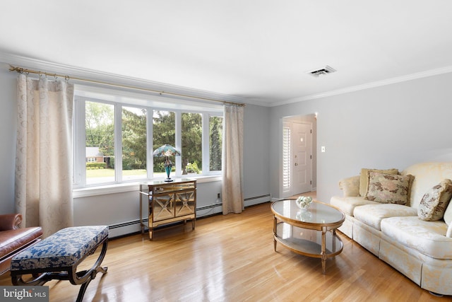 1512 Marsh Rd, Wilmington, DE 19803 - living room featuring ornamental molding, a baseboard heating unit, and light wood-style floors