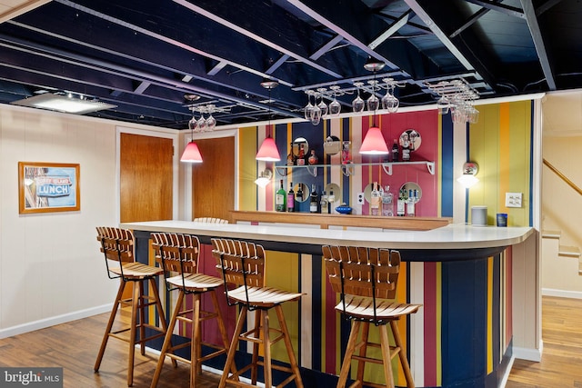 1512 Marsh Rd, Wilmington, DE 19803 - indoor dry bar with wood finished floors and stairway