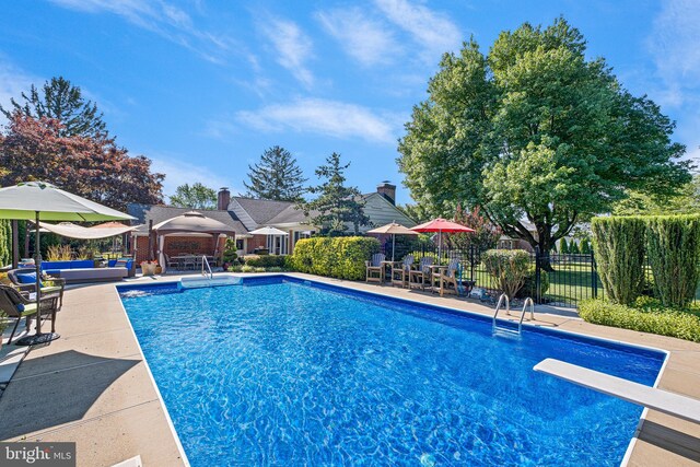 1512 Marsh Rd, Wilmington, DE 19803 - view of swimming pool featuring a patio area, a gazebo, and a diving board