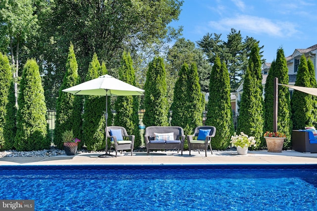 1512 Marsh Rd, Wilmington, DE 19803 - swimming pool featuring a patio and an outdoor hangout area