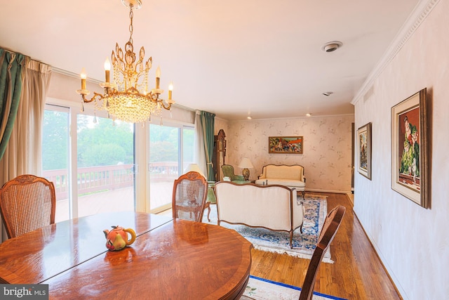 7119 Pheasant Cross Dr, Baltimore, MD 21209 - dining area with wallpapered walls, a chandelier, wood finished floors, plenty of natural light, and crown molding