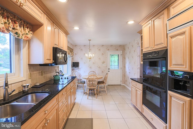 7119 Pheasant Cross Dr, Baltimore, MD 21209 - kitchen with black appliances, a chandelier, light tile patterned floors, wallpapered walls, and dark stone countertops