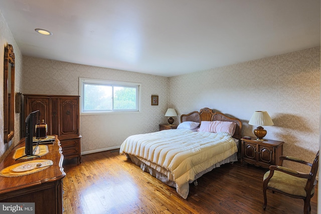 7119 Pheasant Cross Dr, Baltimore, MD 21209 - bedroom with wallpapered walls and wood finished floors