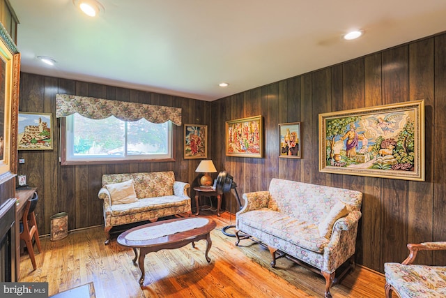 7119 Pheasant Cross Dr, Baltimore, MD 21209 - living area with wooden walls, wood finished floors, and recessed lighting
