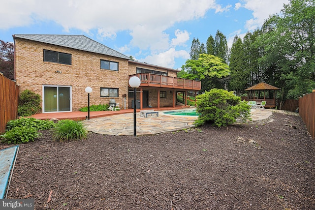 7119 Pheasant Cross Dr, Baltimore, MD 21209 - back of property with a gazebo, a deck, a patio, and a fenced backyard