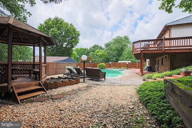 7119 Pheasant Cross Dr, Baltimore, MD 21209 - fenced backyard featuring a deck, a patio area, and a gazebo