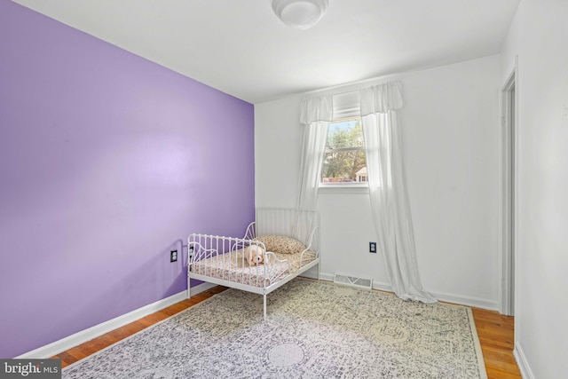 7918 Wicker Ln, La Plata, MD 20646 - bedroom with wood finished floors and baseboards