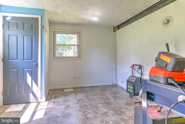 7918 Wicker Ln, La Plata, MD 20646 - entrance foyer with a textured ceiling and baseboards