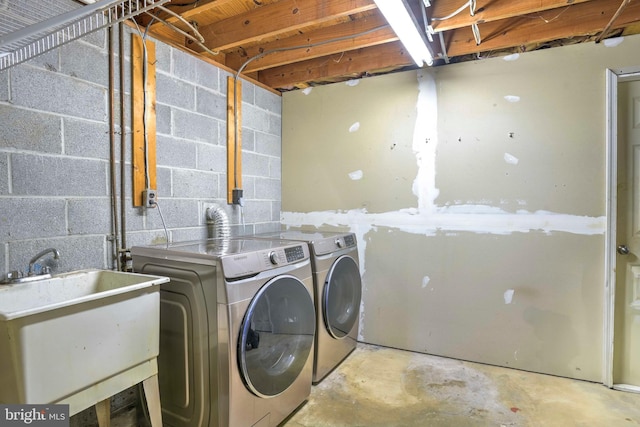 7918 Wicker Ln, La Plata, MD 20646 - washroom featuring washer and clothes dryer and concrete block wall