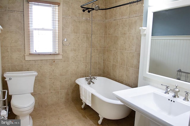 736 Seitz St, Easton, PA 18042 - bathroom featuring tile walls, a soaking tub, plenty of natural light, tile patterned floors, and a shower