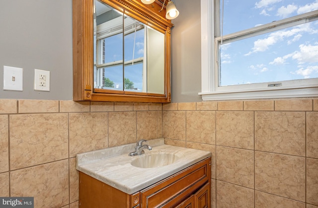 4352 Sheldon Ave, Baltimore, MD 21206 - bathroom with vanity and tile walls