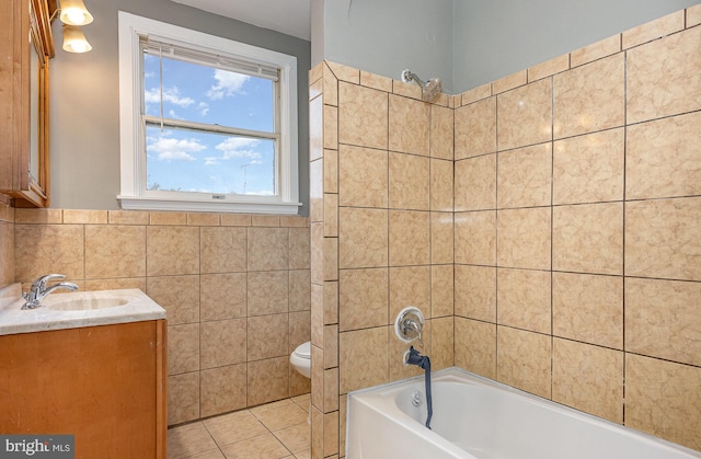 4352 Sheldon Ave, Baltimore, MD 21206 - full bathroom with vanity, tile walls, shower / bathtub combination, and tile patterned flooring