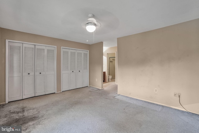 20207 Laurel Hill Way, Germantown, MD 20874 - unfurnished bedroom with two closets, carpet flooring, and ceiling fan
