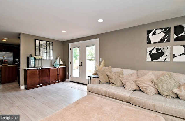 1437 Hilltop Rd, Pottstown, PA 19464 - living area with french doors, light wood-style floors, and recessed lighting
