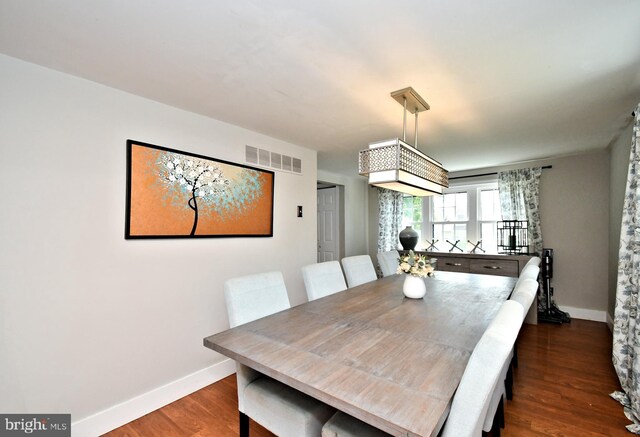 1437 Hilltop Rd, Pottstown, PA 19464 - dining room featuring baseboards and dark wood finished floors