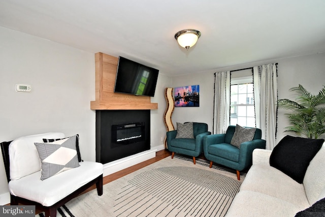 1437 Hilltop Rd, Pottstown, PA 19464 - living area with a large fireplace and wood finished floors