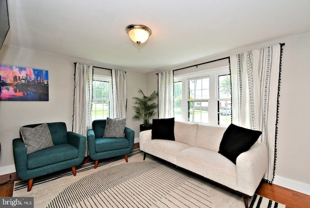 1437 Hilltop Rd, Pottstown, PA 19464 - living room with healthy amount of natural light and wood finished floors
