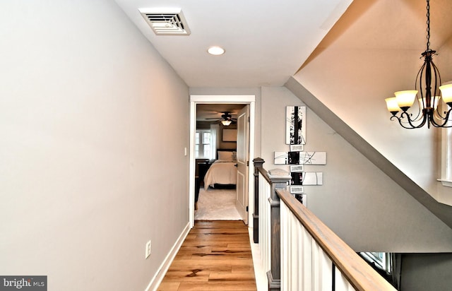 1437 Hilltop Rd, Pottstown, PA 19464 - corridor featuring light wood-style floors, recessed lighting, an upstairs landing, and a chandelier