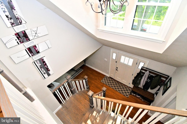 1437 Hilltop Rd, Pottstown, PA 19464 - entryway with dark wood-style floors, healthy amount of natural light, a chandelier, and a towering ceiling