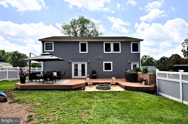 1437 Hilltop Rd, Pottstown, PA 19464 - back of house with an outdoor fire pit, french doors, and a wooden deck