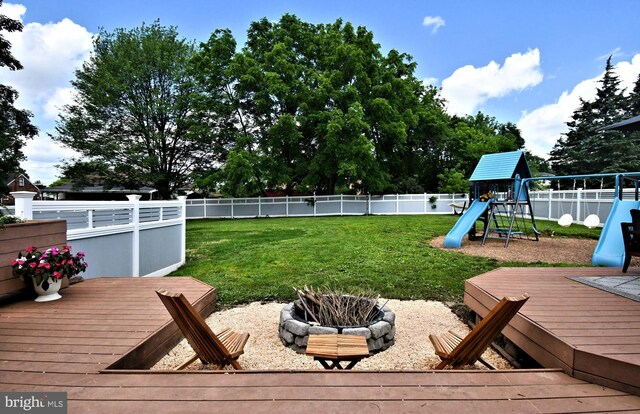 1437 Hilltop Rd, Pottstown, PA 19464 - deck featuring a playground and a fenced backyard