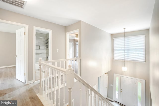 7 Somerset Ct, Annapolis, MD 21403 - corridor with an upstairs landing and light wood-style floors